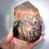 Garden quartz with amphibole tower