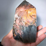 Garden quartz with amphibole tower